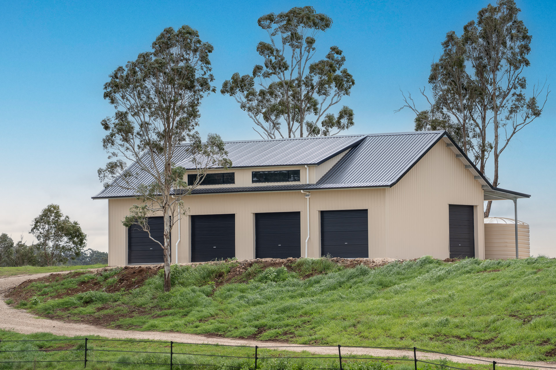 Heavy-duty farm shed for grain equipment